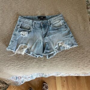 Cato Women's Distressed Denim Shorts - Light Blue